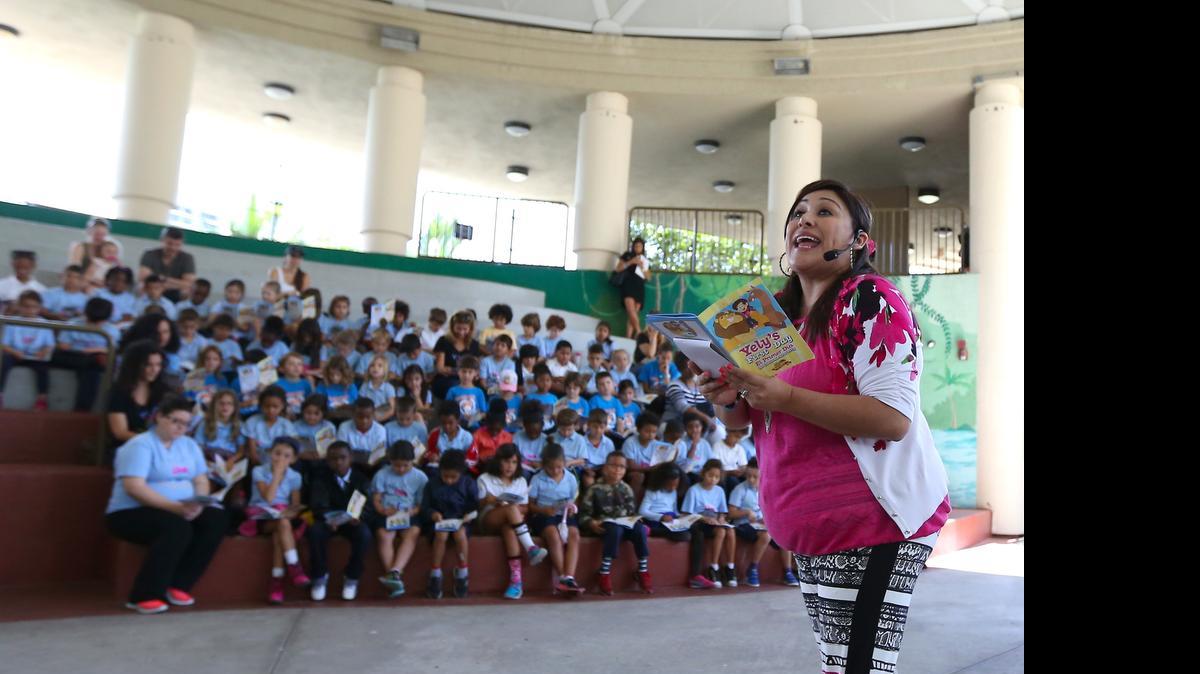 
Mexican-American actress and author Yelyna Leon Ortega reads from her book, ‘The First Day of Yely,’ to the students of DCPS Primary Learning Center and Lillie C. Evans K-8 Center.

