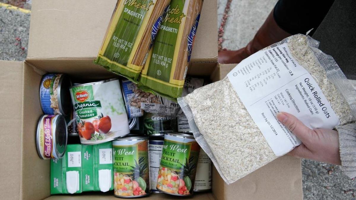 This Jan. 8, 2014, photo shows the contents of a specially prepared box of food at a food bank in Petaluma, Calif. New data shows that one in four Florida adjuncts are food insecure.