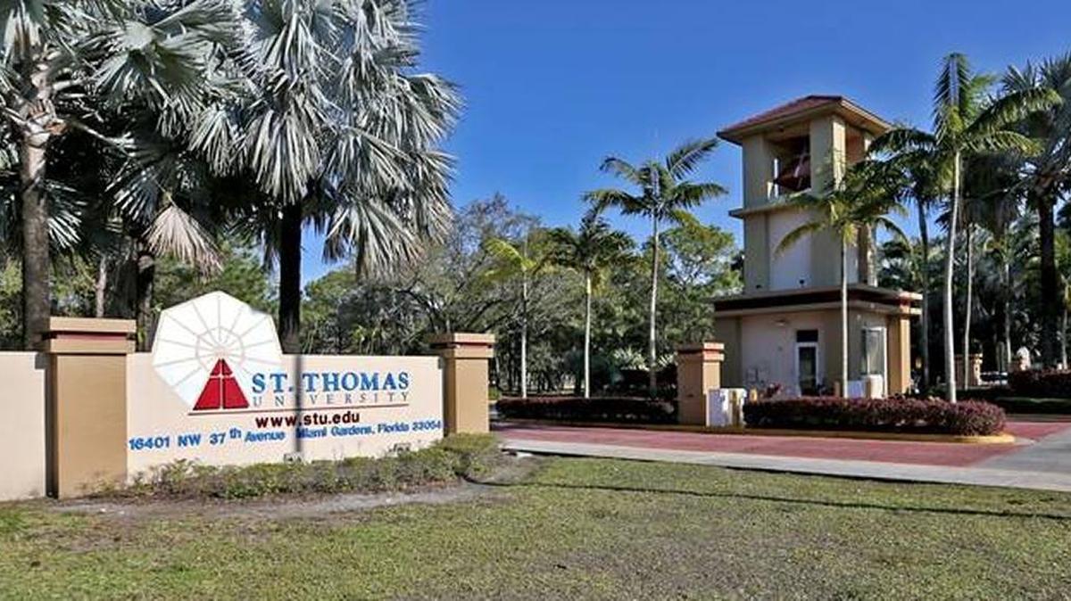 The gated west entrance of St. Thomas University in Miami Gardens Wednesday, March 15, 2017.