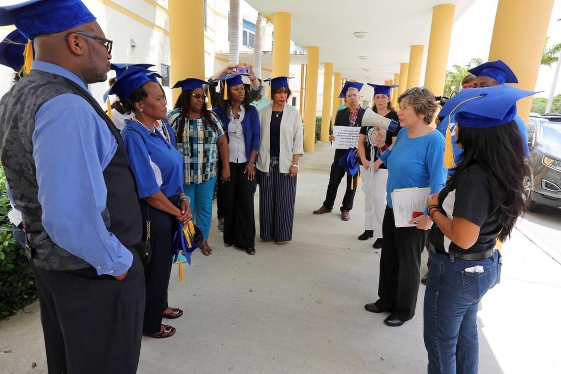 Randi Weingarten, the president of the American Federation of Teachers, uses a bullhorn to talk to teachers at Carol City Senior High School in Miami Gardens on Monday, May 1, 2017. The rally and others like it were held at Miami schools that could lose funding under the Trump Administration’s proposed budget cuts.