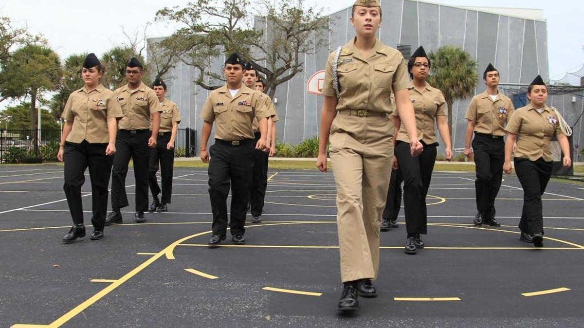 Shantell Gonzalez, center, an Alonzo and Tracy Mourning Senior High eleventh grader, leads fellow cadets in drills.