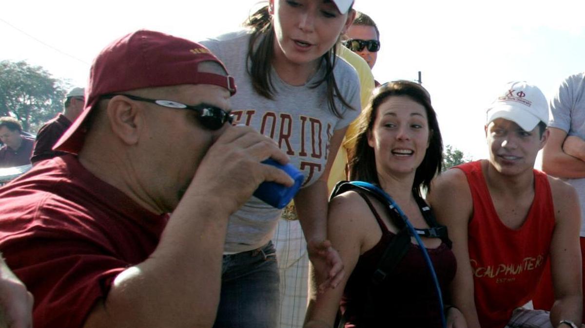 
Fans play a drinking game before a Florida State football game. FSU made the Princeton Reviews list of Top 20 party schools again this year, in large part because of students’ beer consumption.
