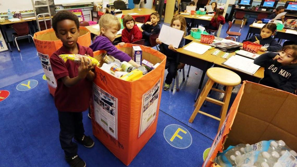 The students at AIE Charter School in Miami Springs are hosting their annual Thanksgiving Food Drive. Kindergarten students Gregory Anotoine and Myah Marmolejos talk about some of the items that their class donated. The kindergarten class brought in the most donations during the drive.