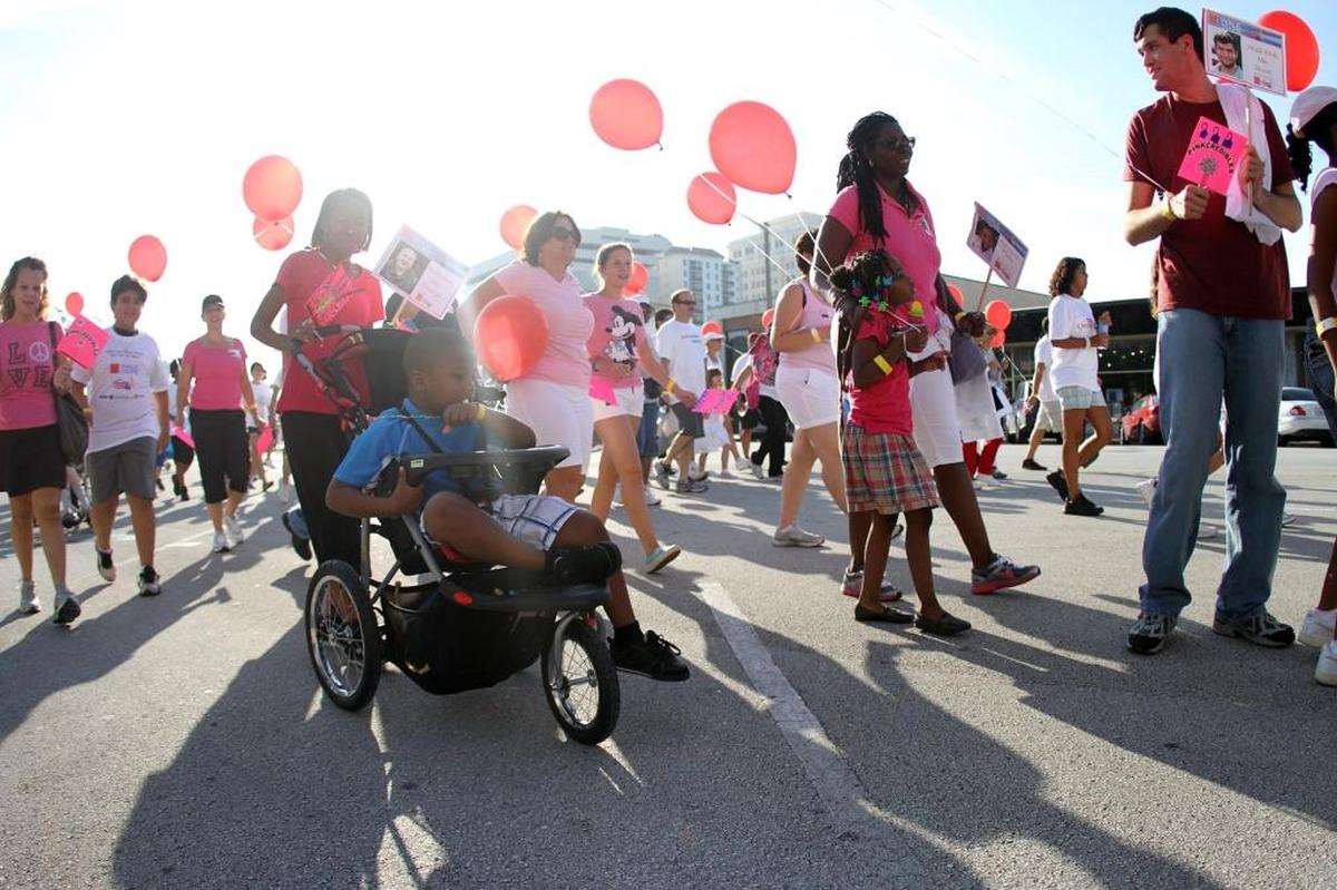 Kids and adults with disabilitiesas their families kick off the Easter Seals Walk With Me event in Coral Gables on Saturday, Oct. 1, 2011. Easter Seals runs three summer camps in Miami-Dade for children with disabilities.