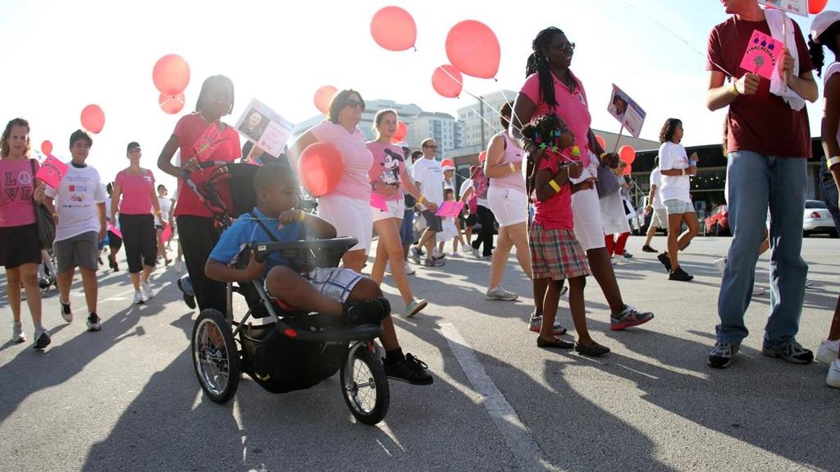Kids and adults with disabilitiesas their families kick off the Easter Seals Walk With Me event in Coral Gables on Saturday, Oct. 1, 2011. Easter Seals runs three summer camps in Miami-Dade for children with disabilities.