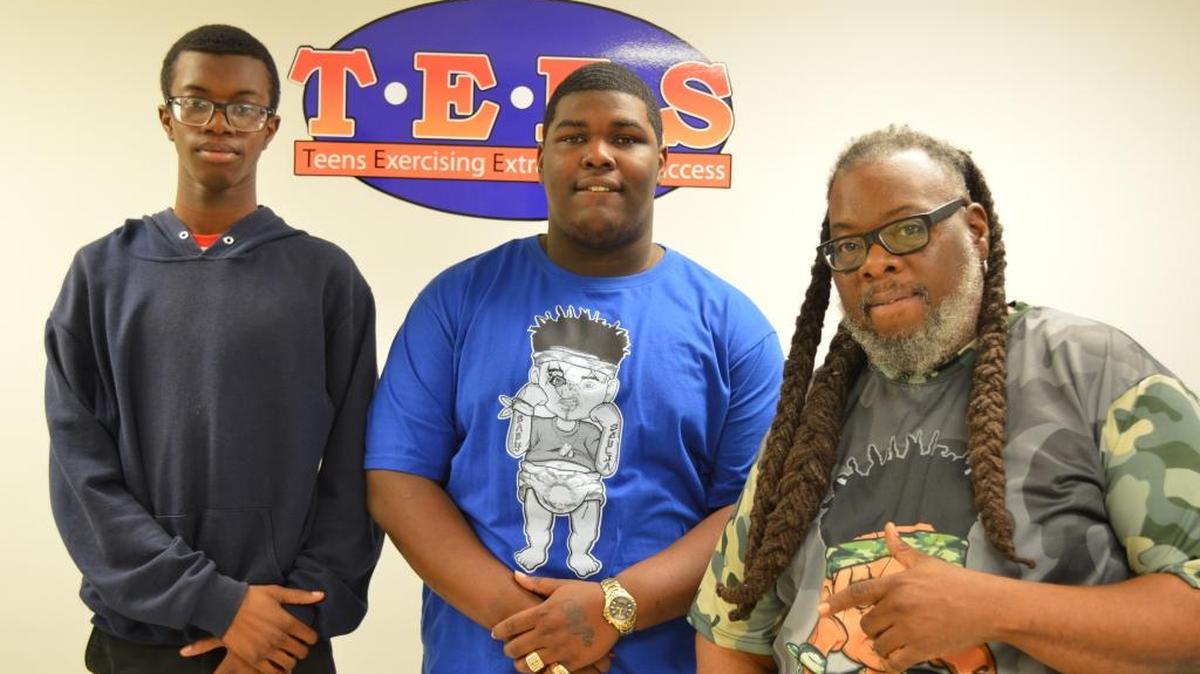 Elijah Muhammad, Jonathan Jackson and Theodore Taylor pose for a quick photo at T.E.E.S.’ Overtown campus.