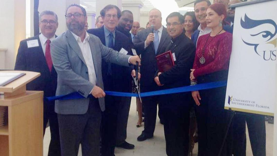 Until the end, for-profit college operator Ernesto Perez was surrounded by politicians. Included in this photo at a ribbon-cutting five weeks ago: Perez, second from left; state Sen. Dwight Bullard, fourth from left; and, in back row at right, state Sen. Anitere Flores, state Sen. Rene Garcia, Coral Gables Vice Mayor Frank Quesada and state Sen. Oscar Braynon (obscured).