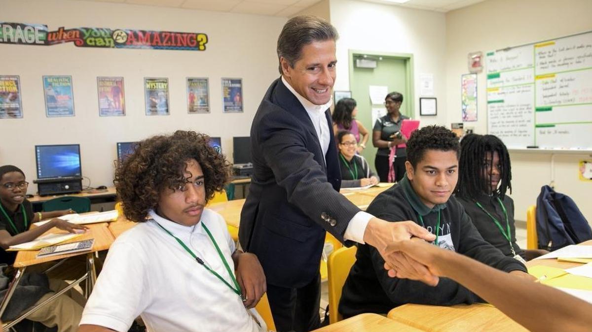 Miami-Dade County Public Schools Superintendent Alberto Carvalho greets students in a class on Intensive Reading at Miami Jackson Senior High School on the first day back to school after Hurricane Irma on Monday, Sept. 18, 2017.