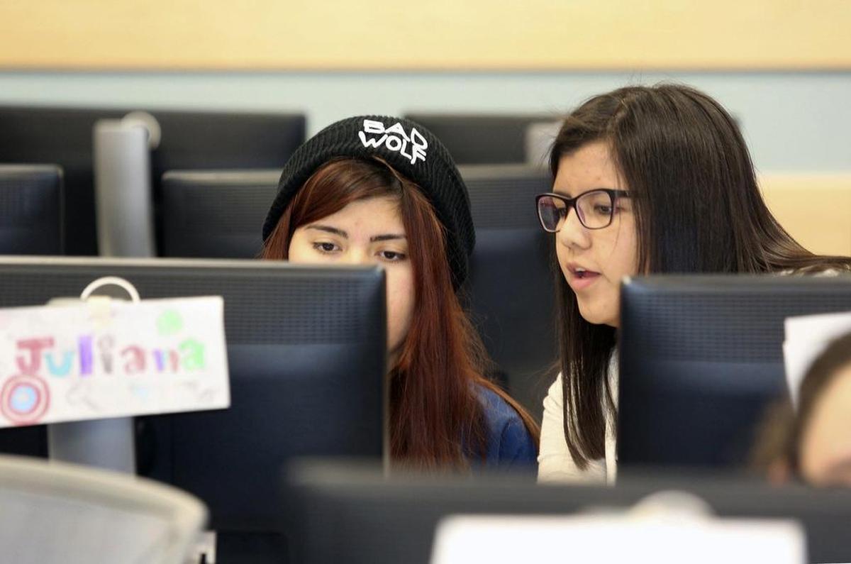 Juliana Hernandez, 16, of Miami, left, a rising senior at Robert Morgan Educational Center, works on coding with Alyson Palma, 15, of Cutler Bay, a rising junior at Doral Academy. They attended an intensive computer skills summer immersion program presented by Florida International University's School of Computing and Information Sciences and Girls Who Code, a national non-profit organization that equips girls with computing skills. 
