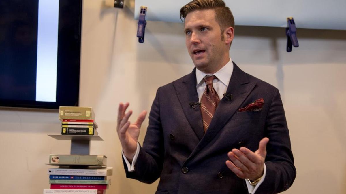 White nationalist Richard Spencer speaks to select media in his office space on August 14, 2017 in Alexandria, Virginia.