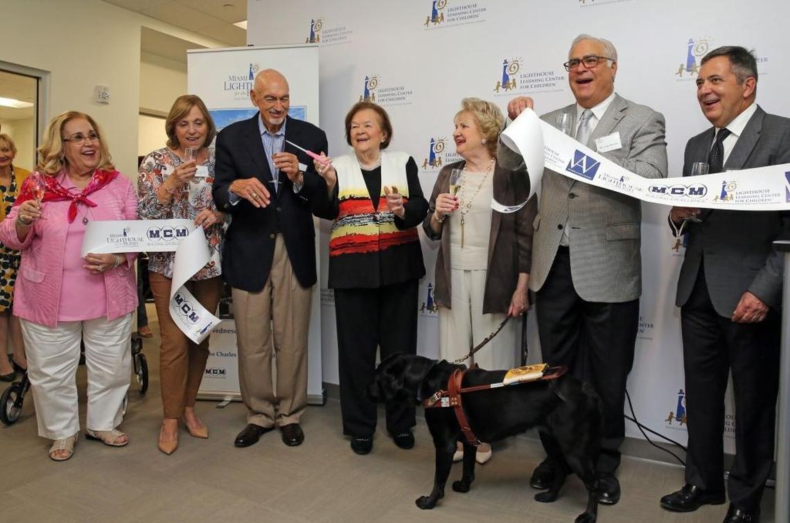 Miami Lighthouse for the Blind and Visually Impaired celebrated its Learning Center for Children™ on Wednesday, Aug. 16, 2017. From left: Ophelia Roca, Olga and Charles Nielson, Mary Spencer, Virginia Jacko with guide dog Eva, Jorge Munilla, and Marcel Morlote.