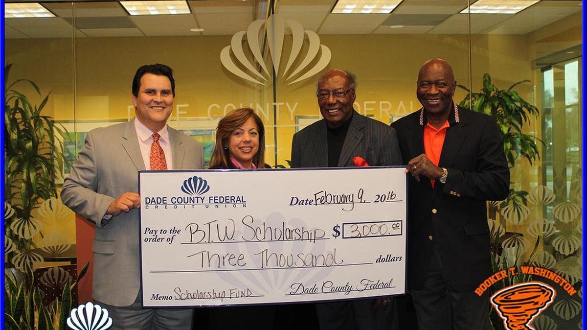 The Booker T. Washington High School Foundation recently received a $3,000 donation from Dade County Federal Credit Union. From left: George Joseph, president and CEO of Dade County Federal Credit Union (DCFCU); Annie Wilkinson, executive vice president, DCFCU; Walter Perkins, treasurer, Booker T. Washington High Foundation; and John Glover, president and CEO of the Foundation.