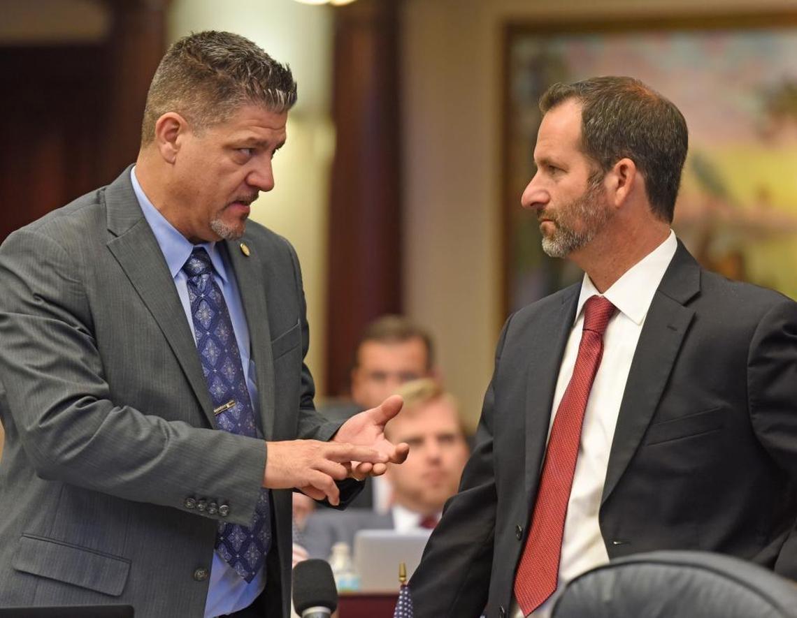 State Rep. Bob Cortes, R-Altamonte Springs, talks with House Education Committee chairman Michael Bileca, R-Miami, on the House floor in April.