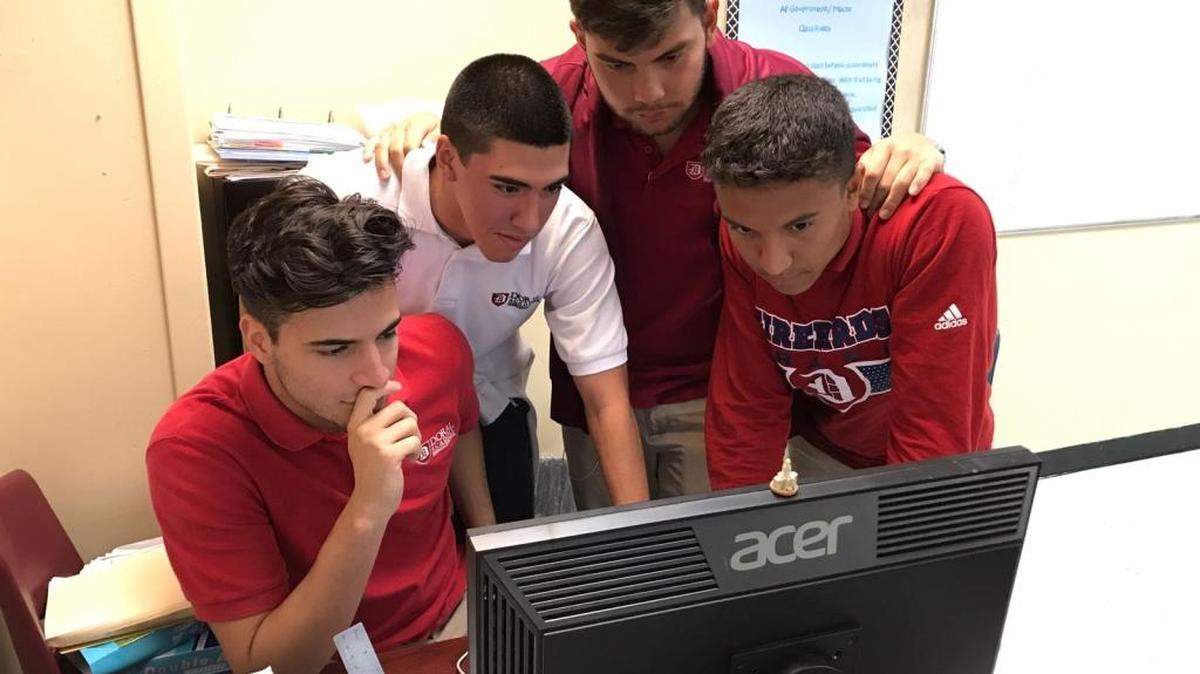 From left, Doral Academy 11th graders Juan Laguado, Ariel Garcia, Juan Torres and German Fernandez.