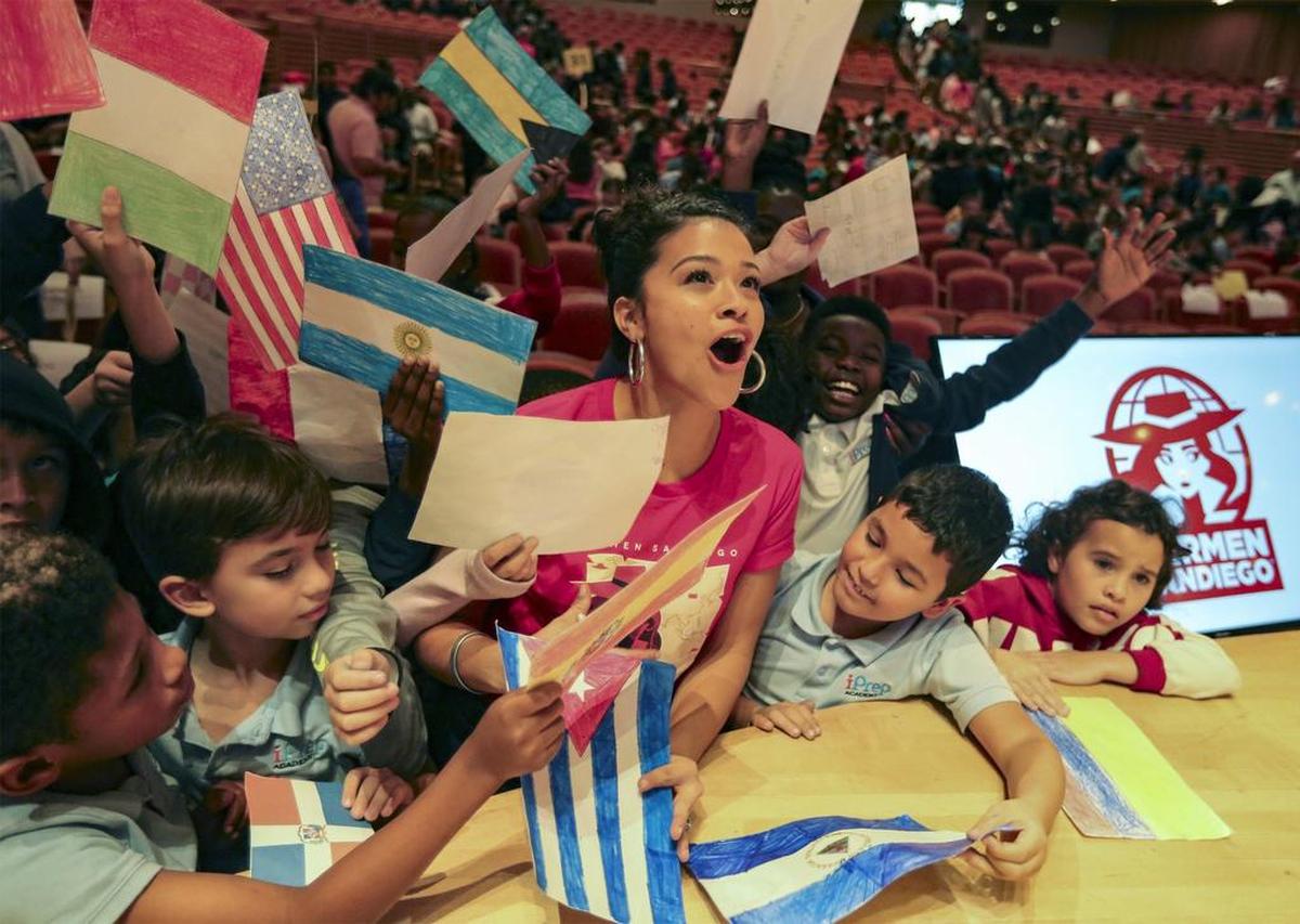 At center, Gina Rodriguez, the voice of animated character Carmen Sandiego, hosts a live-action game show at the Arsht Center’s Knight Concert Hall celebrating the relaunch for 1,700 Miami-Dade County public school kids who attended the event in Miami on Tuesday, January 8, 2019.