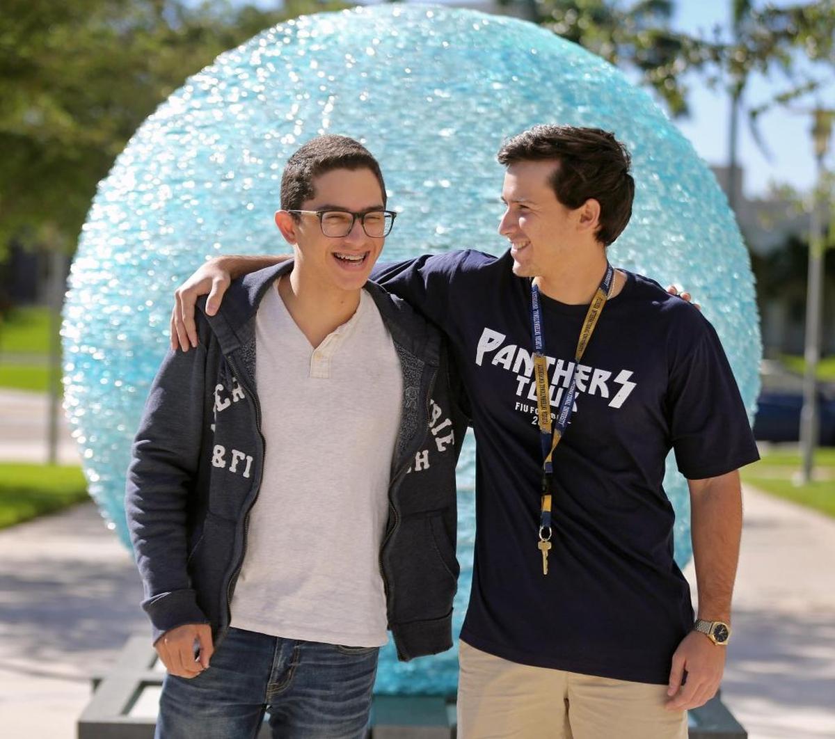 Childhood friends Ricardo Neco, 19, left, and Omar Jimenez, 20, who fled Puerto Rico after Hurricane Maria and started classes at Florida International University, on FIU campus on Wednesday, October 26, 2017.