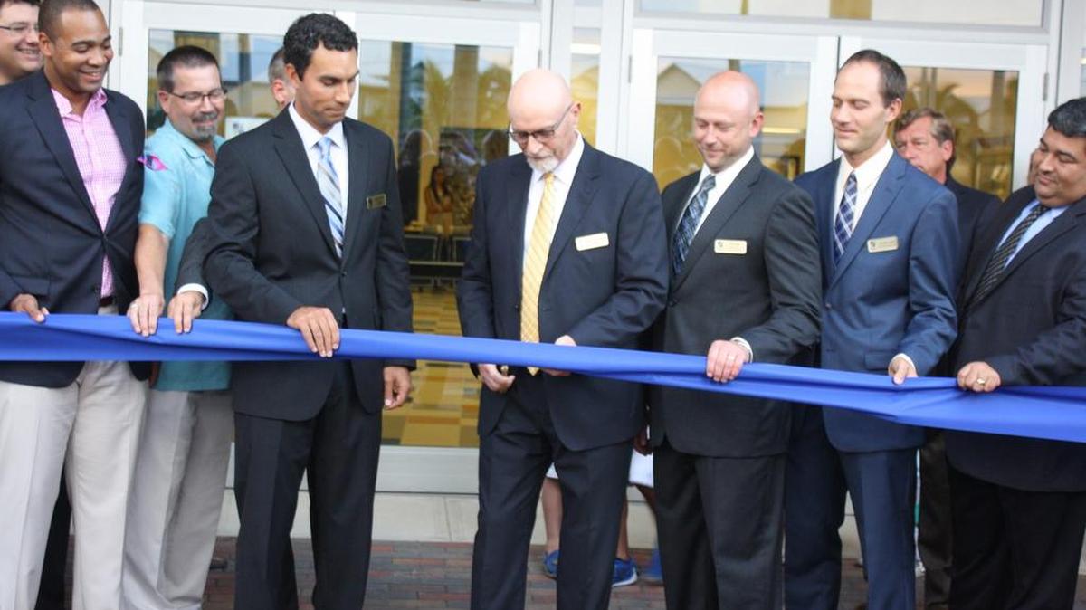 
From left: Michael Cottle of Moss Construction, Michael Kadow of Somerville Architects, Superintendent Carlos Leyrer of Divine Savior Academy, Senior Pastor Carl Leyrer of DSA, Head of Schools Ben Troge of DSA, Elementary & Middle School Principal Tim Biesterfeld of DSA, and DSA Executive Board Member Luis Herrera inaugurate the school's largest expansion with a ribbon-cutting ceremony at the entrance of its new high school facility.
