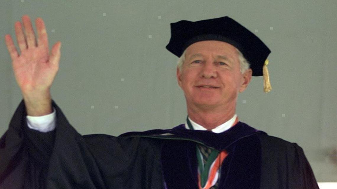 Edward T. "Tad" Foote II the fourth president of the University of Miami waves during graduation ceremony at The University of Miami's 2001 Commencement.
