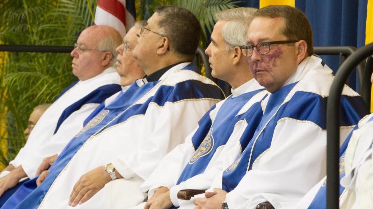 Jesuit Father Guillermo Garcia-Tuñon, incoming president of Belen Jesuit Preparatory School, far right, celebrates Mass, Friday, Jan. 15, 2016, at the school in Tamiami. Hundreds of people turned to welcome the new president.