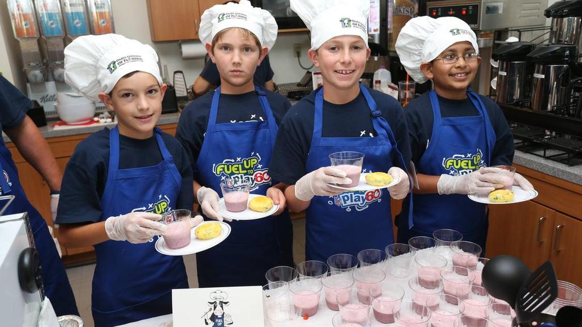 Brody Gullo, Tyler Roth, Michael Aronson and Dillon Patel of Equestrian Trails Elementary show their winning recipe, Breakfast on the Go, during the 2015 Gridiron Cooking Challenge.