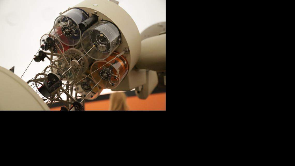 
A newly renovated planetarium will soon be unveiled at Booker T. Washington. The facility, the first of its kind in a Miami-Dade school, will be the centerpiece for the school’s new astronomy magnet program that will begin in August. The planetarium has been in existence for 25 years, but until recently has been used as a storage unit. Shown is the old project that has been replaced with newer technology.
