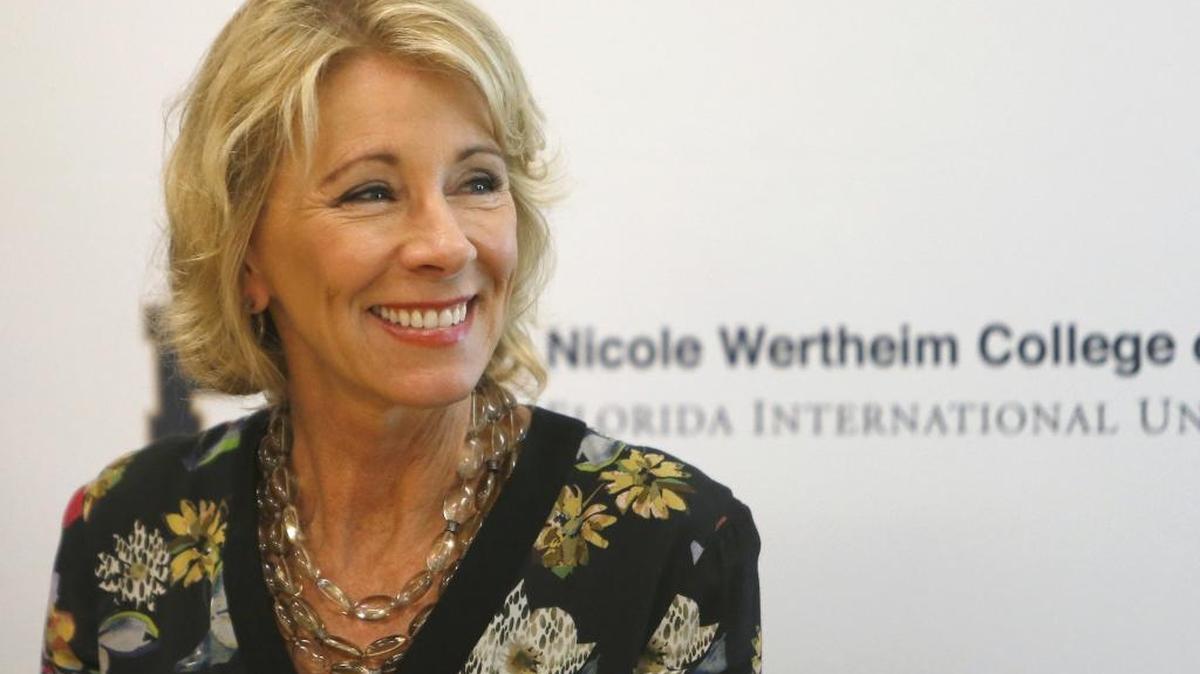 U.S. Secretary of Education Betsy DeVos talks with members of the faculty and students during a tour of Florida International University in Miami earlier this year.