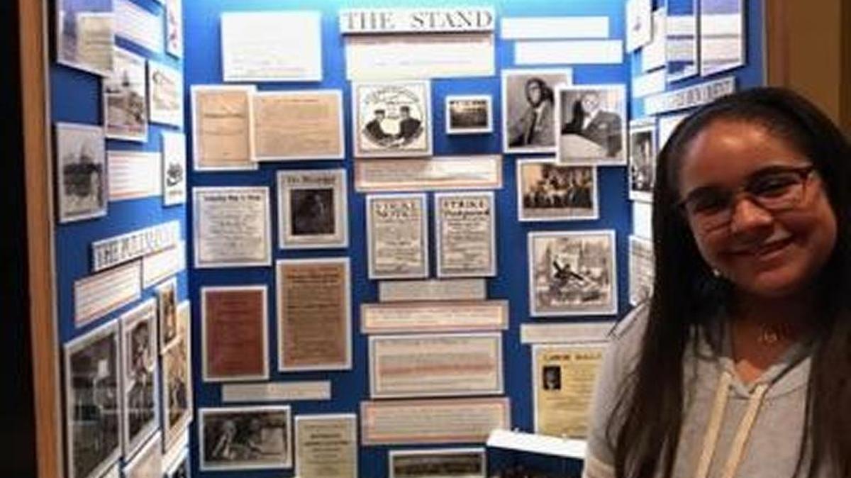Maya Moise of American Heritage School placed first in the National History Day Contest’s Junior Individual Exhibit category. She is pictured with her project called ‘Service Not Servitude.’