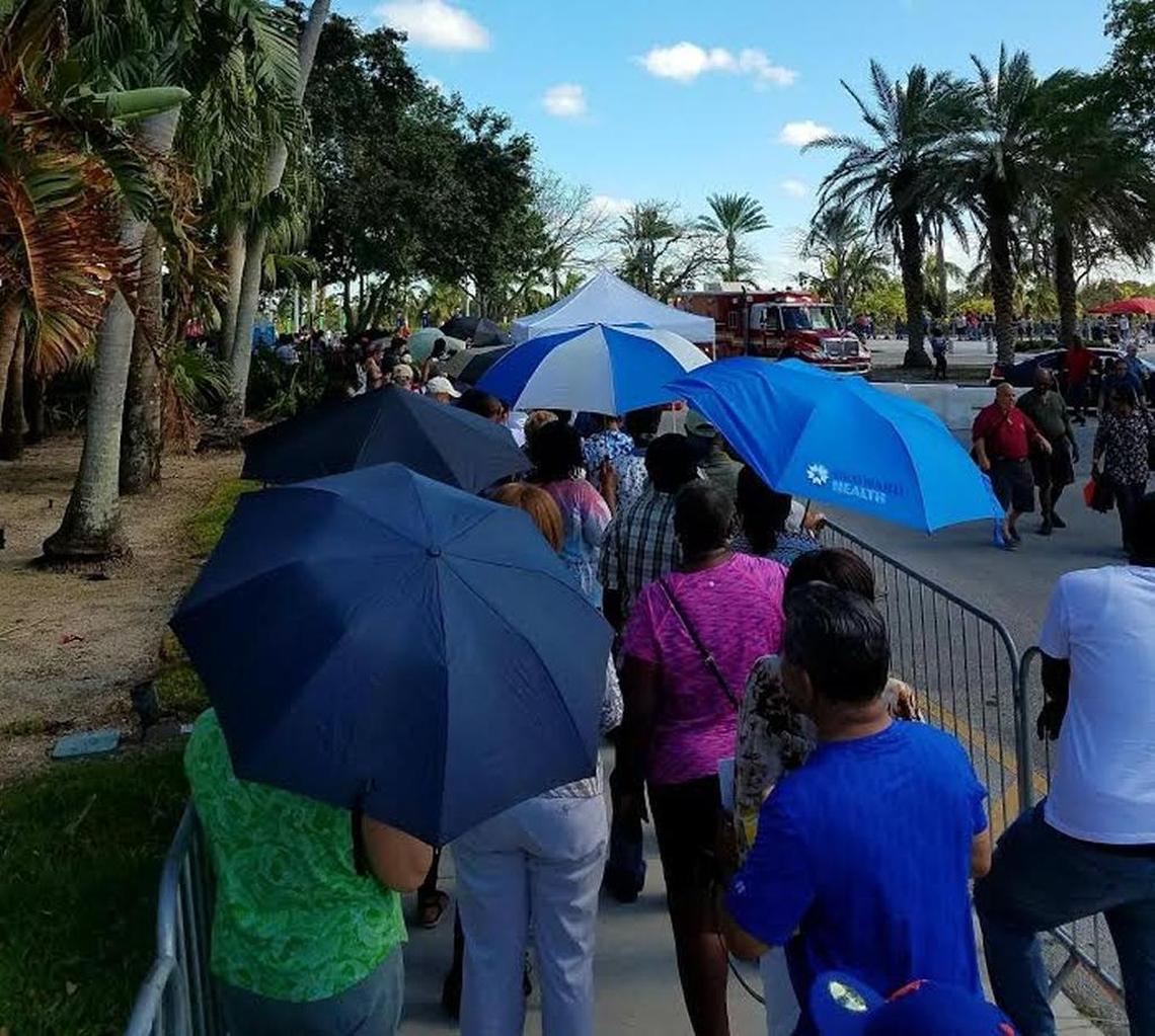 Thousands of people wait in line at the BB&T Center in Sunrise for D-SNAP hurricane relief program, Wednesday, Nov. 8, 2017.