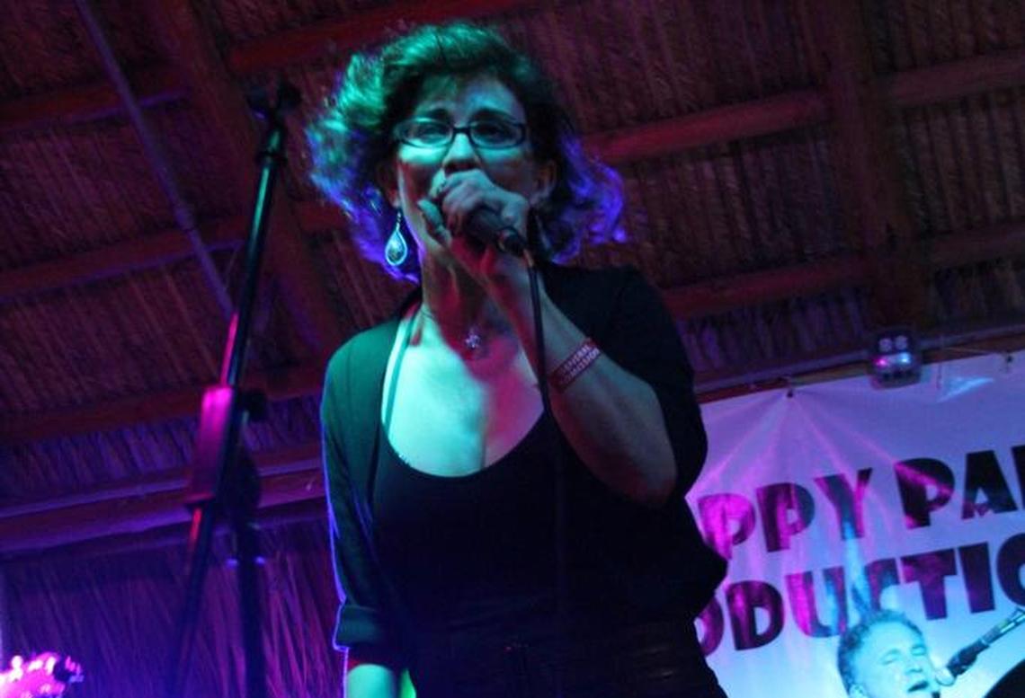 Majica Napoli, lead singer of the funk Latin jazz band, The Baboons, sings during the eighth annual Everglades Awareness Benefit Concert at Gramps on Saturday night.