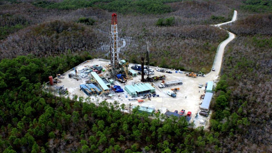 
An aerial photo shows one of the existing oil drilling operations in the Big Cypress National Preserve. A company is asking state permission to drill a new well west of Broward County’s suburbs. 
