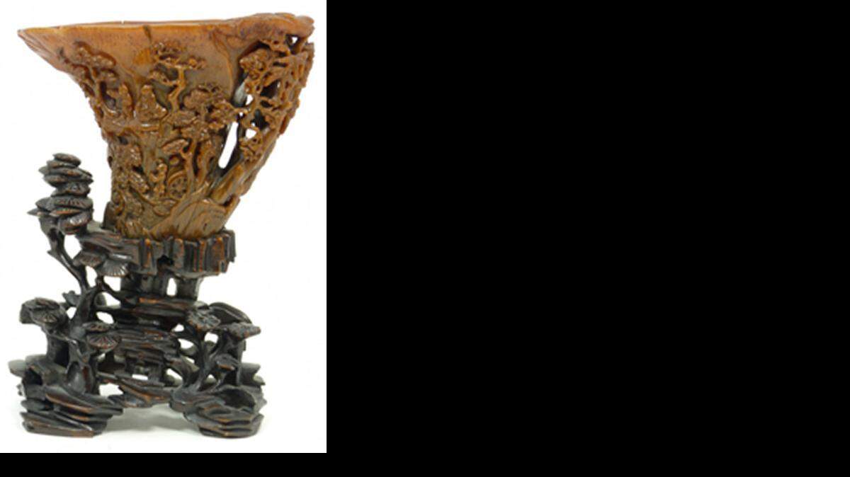 
Elita Decorative Arts listed this “libation cup” carved from a black rhino tusk in a March auction.
