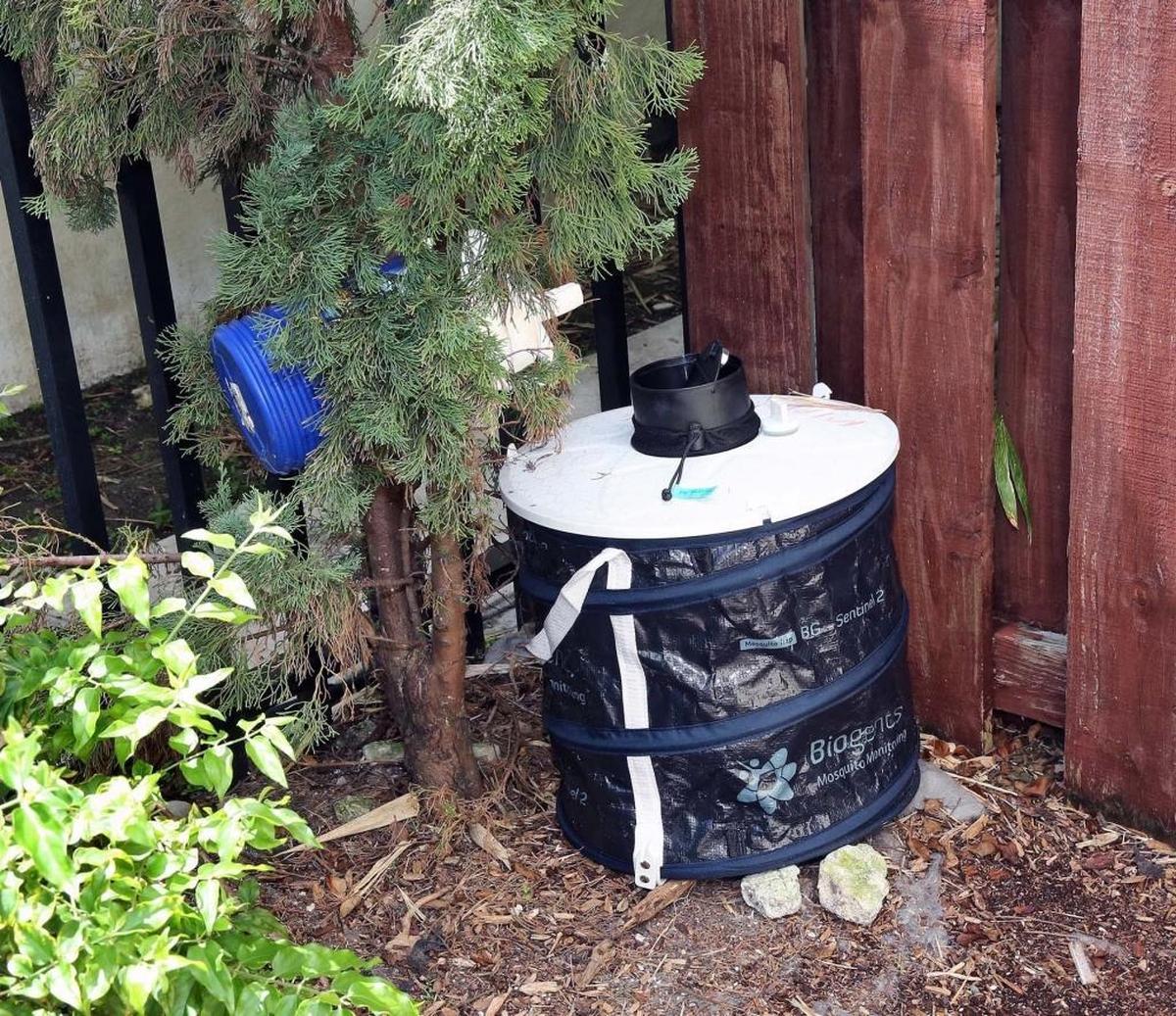 Mosquito traps, like this one set in the 1200 block on Drexel Avenue last year, are showing the number of mosquitoes in the county are increasing.