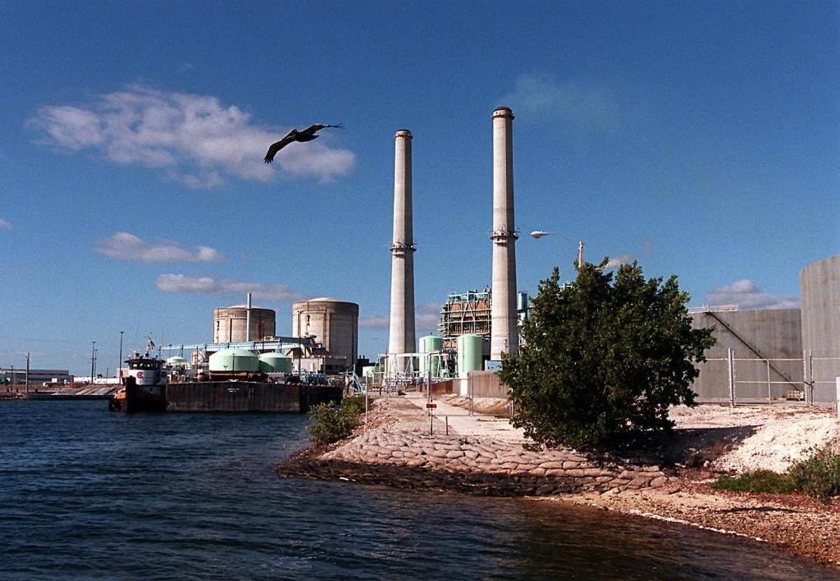 A fuel barge transports oil to Turkey Point in 1999.