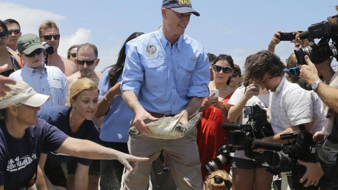 Gov. Rick Scott showed up for a photo op on Key Biscayne to release sea turtles in June but his administration has largely ignored the risk that climate change poses to the state’s coast line.