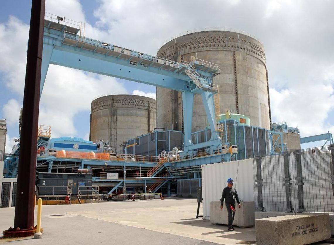 A worker walks near Turkey Point’s existing nuclear reactors on Thursday, May 18, 2017. Land has been cleared for future reactors, but FPL says it is still in the process of obtaining state and federal licensing before it can proceed with a pre-construction phase.
