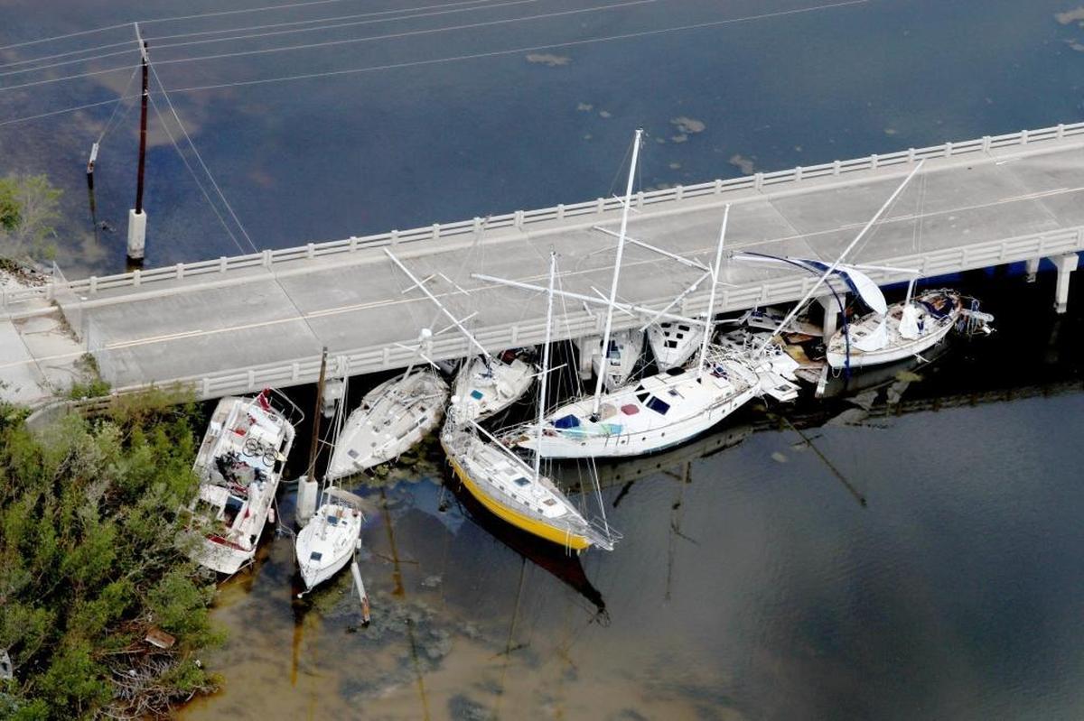 Boats are wedged under a bridge in Marathon in the Florida Keys after Hurricane Irma.