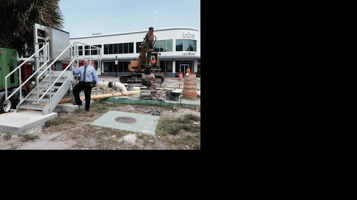 
Miami Beach Public Works director Eric Carpenter stands next to a project along Purdy Avenue, where workers are installing a piece of the city's expansive pump system.
