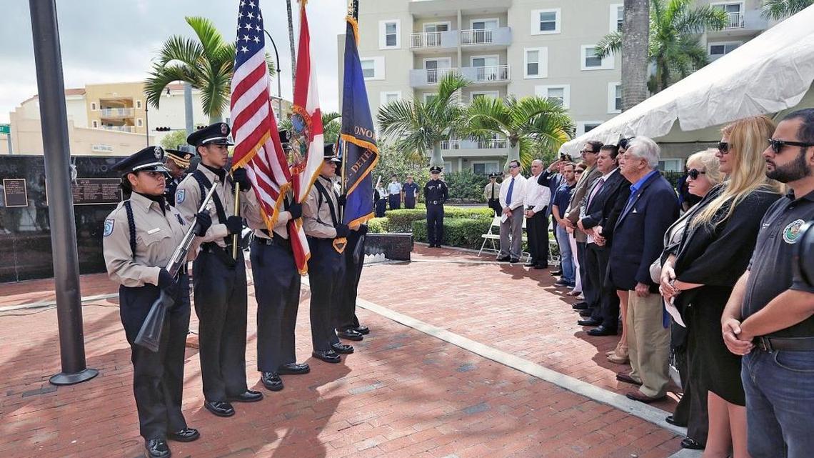 Hialeah cadets present the colors at the annual Memorial Day Ceremony at Triangle Park in Hialeah on Monday May 25, 2015