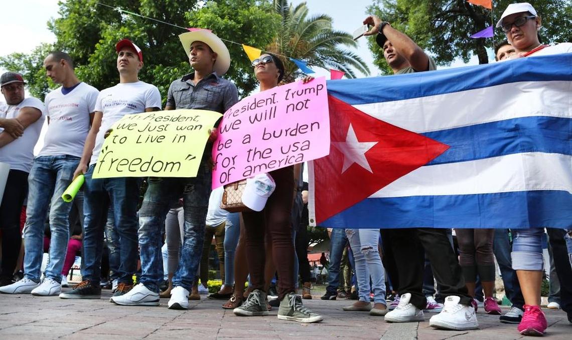 Cubans stranded in Nuevo Laredo, Mexico gather at Plaza Juarez in the border city to hold a rally and march from the plaza to the International Bridge.