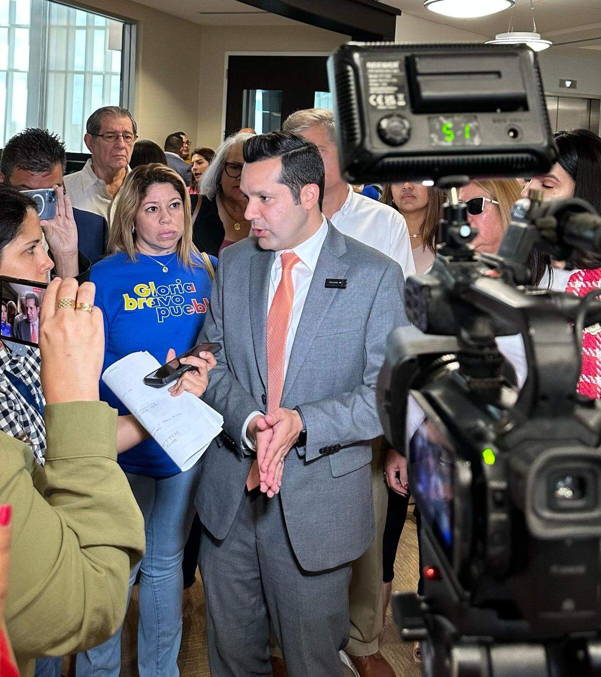Doral Councilman Rafael Pineyro addresses the media after the city council unanimously approved a resolution he sponsored, urging President Trump to find a solution for law-abiding Venezuelans following the revocation of TPS under the Trump administration.