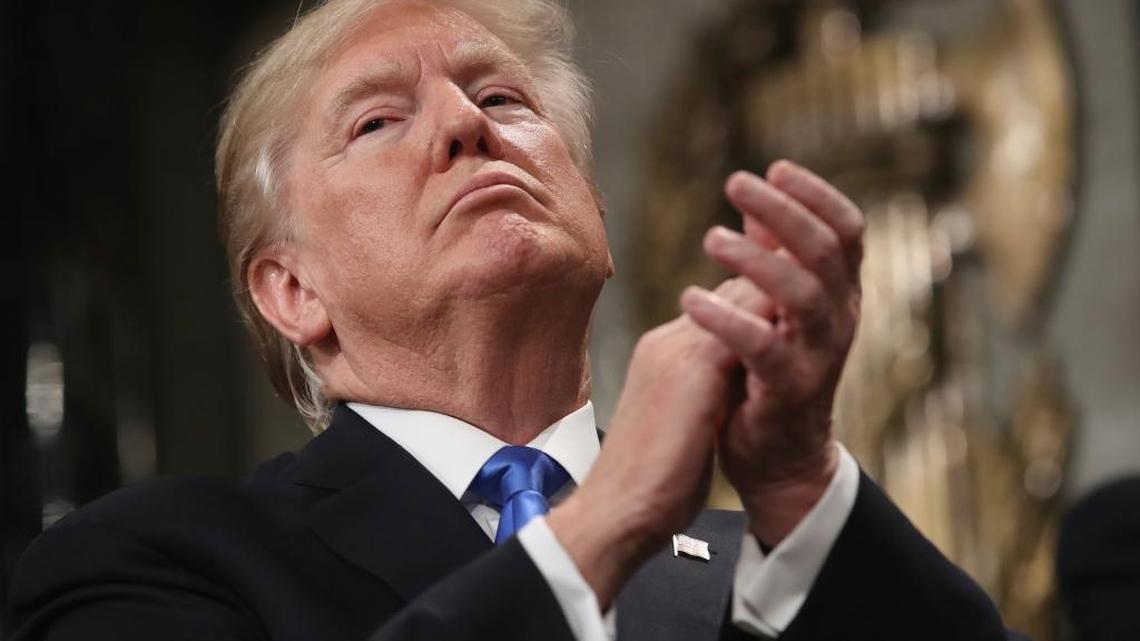President Donald Trump applauds as he finishes his first State of the Union address in the House chamber of the U.S. Capitol to a joint session of Congress Tuesday, Jan. 30, 2018 in Washington.
