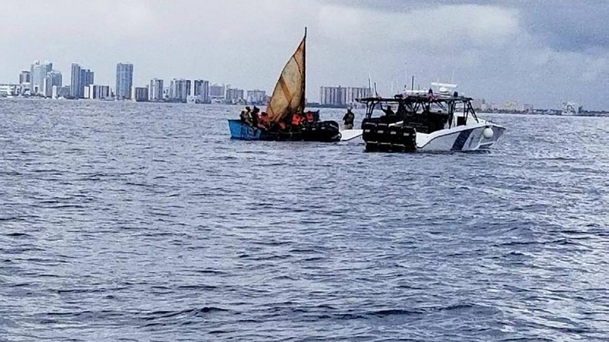 Thirteen Cuban migrants trying to reach U.S. shores were picked up by federal immigration authorities Wednesday just off the Dania Beach pier in Broward.