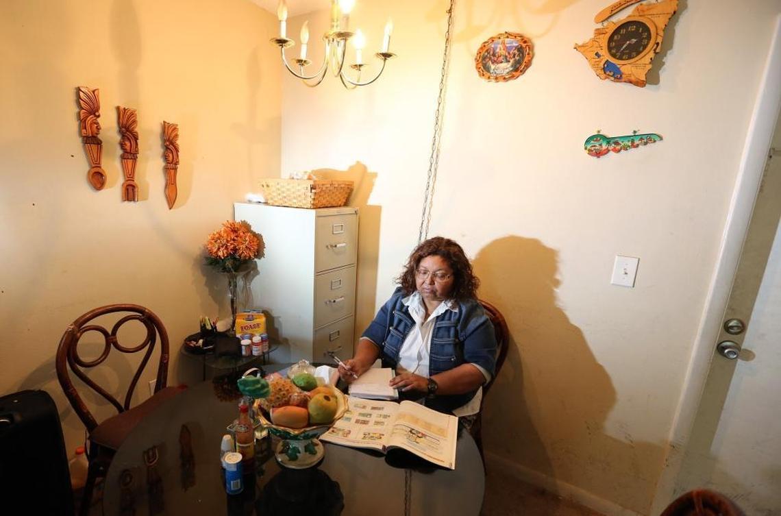 Maria Elena Hernandez, a 58-year-old immigrant from Nicaragua, works on English homework for a class she is taking, at the dining room table of an apartment in Plantation that she shares with her family. Hernandez has been living in South Florida legally for the past 19 years. The Trump administration has announced it is ending TPS for Nicaraguans like Hernandez. Their status now expires in January 2019.