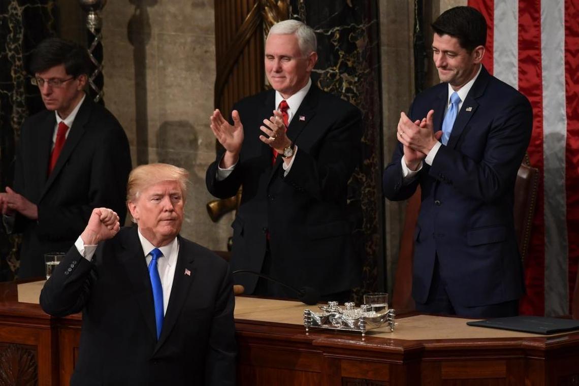 President Donald Trump gestures at the end of his State of the Union address to a joint session of Congress on Capitol Hill in Washington, Tuesday, Jan. 30, 2018.