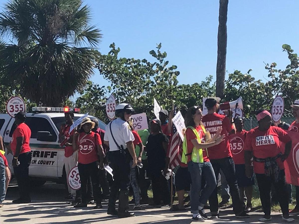 Hospitality workers gathered outside Mar-a-Lago Tuesday to protest the Trump administration’s decision to end temporary protected status for Haitians and others.