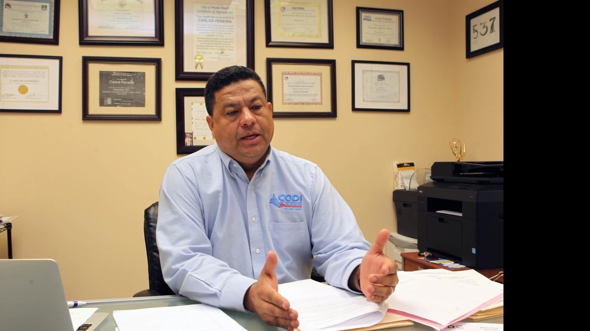 
Carlos M. Pereira, executive director of El Centro de Orientación del Inmigrante (CODI), an immigrant rights group assisting a Dominican in trying to bring his son to the United States.
