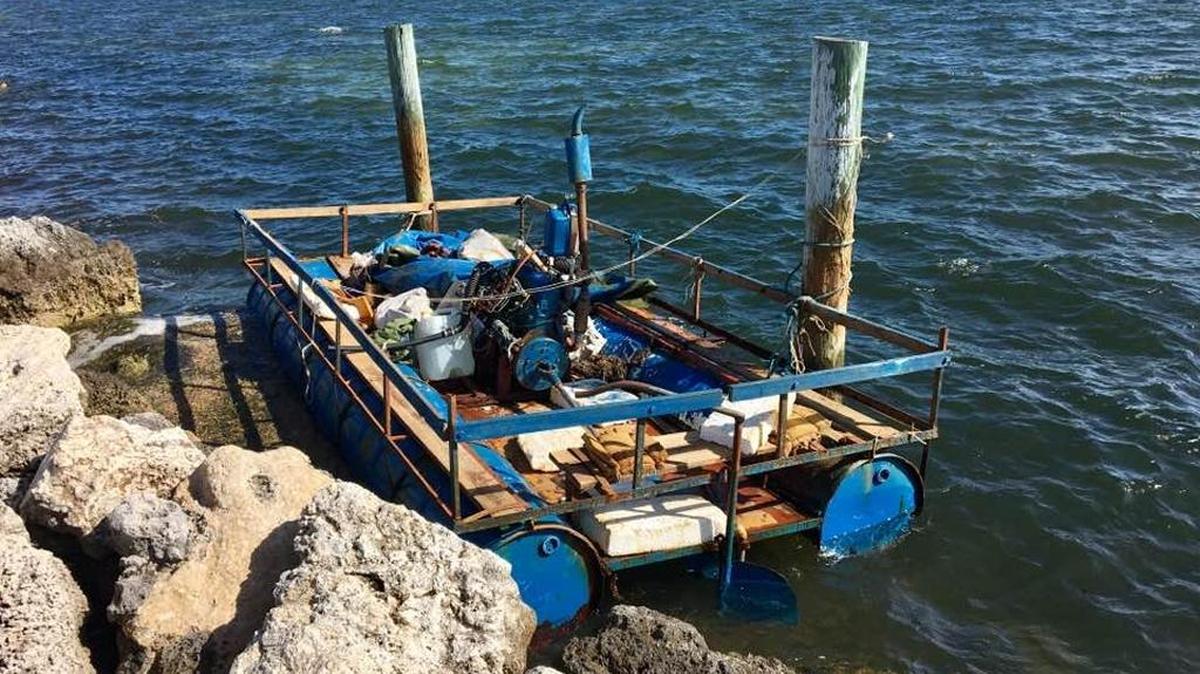 A rustic vessel made by Cuban migrants is docked behind Key Largo Ocean Resort in Key Largo. It likely arrived Monday, Dec. 19