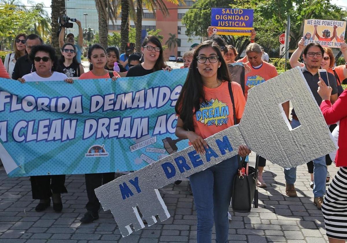 Nery Lopez, a DACA recipient, right, carried the ‘Dream Key’ on Jan. 22, 2018, as she led supporters of Dreamers in a protest in South Florida. The marchers were made up of immigrant youths, mothers and community members from United We Dream, We Belong Together, Students Working for Equal Rights, Florida Immigrant Coalition, We Count!, Women Working Together, Friends of Miami-Dade Detainees, and the Florida Student Power Network. They marched to the front door of U.S. Sen. Marco Rubio’s district office in Doral, but were denied access due to the government shutdown and Sen. Rubio’s presence in Washington, D.C.