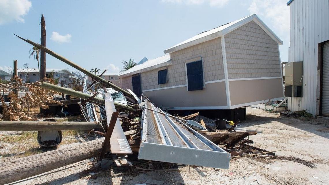 Damaged property litters the side of Overseas Highway in Big Pine Key following Hurricane Irma on Sept. 19, 2017.