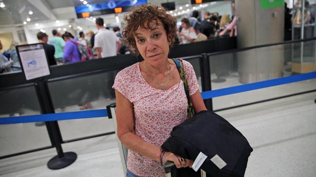An exhausted and frustrated Carole Cox from New York has been stuck at Miami International Airport since 1 p.m. and was forced to take a flight to Raleigh to wait out the storm on Monday, March 13, 2017. Flights have been canceled to the Northeast due to massive snowstorms.